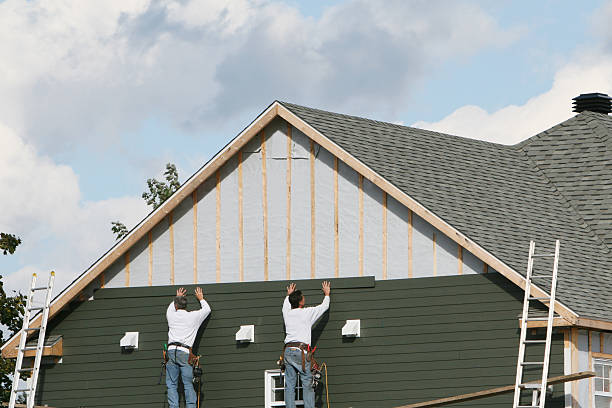 Professional Emergency Siding Repair technician working in Colmar, PA